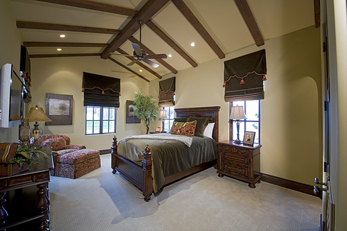 Spacious bedroom interior of luxury mansion