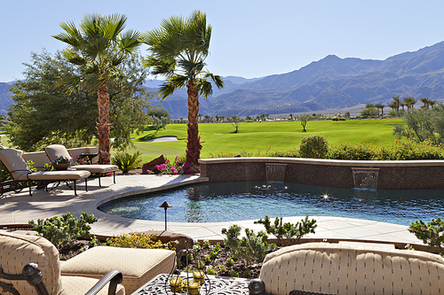 View of mountains with swimming pool in foreground