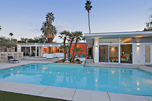 Swimming pool in front of luxurious villa