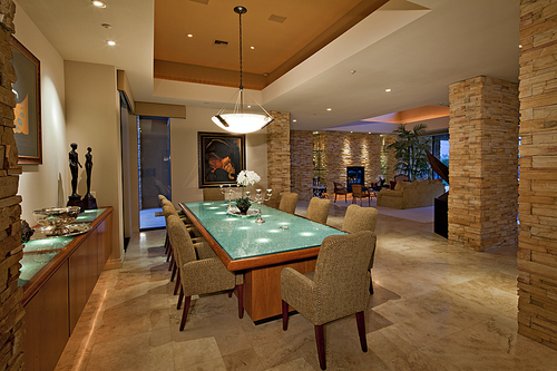 Dining room with chandelier in luxury mansion