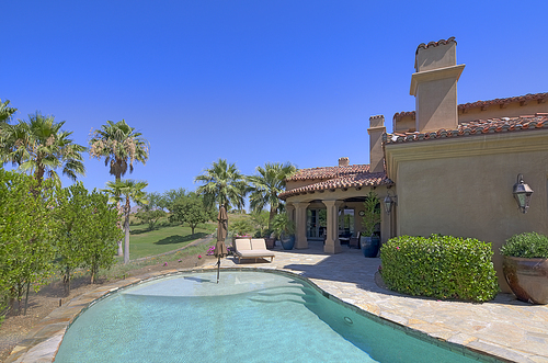 Swimming pool outside luxury villa