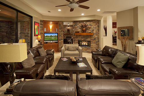 Leather seating furniture in living room of luxury mansion