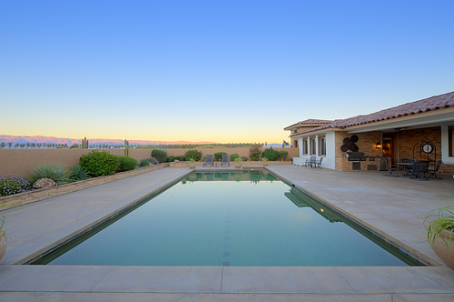 Scenic view of swimming pool with landscape in background