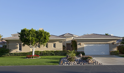 Front of house with lawn and driveway