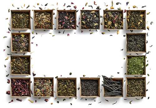 Large assortment of teas in the form of a frame on a white background. The view from the top.