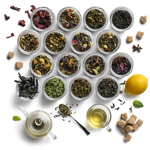 Large assortment of tea on a white background. The view from the top.