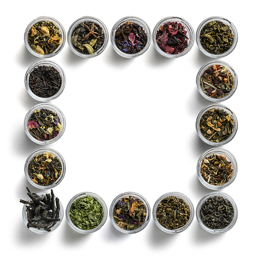 Large assortment of teas in the form of a frame on a white background. The view from the top.