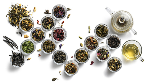 Large assortment of tea on a white background. The view from the top.