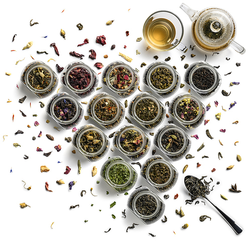 Large assortment of tea on a white background. The view from the top.