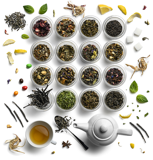 Large assortment of tea on a white background. The view from the top.