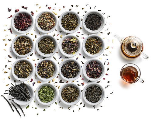 Large assortment of tea on a white background. The view from the top.