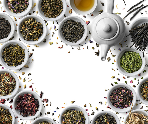 Large assortment of tea on a white background. The view from the top.