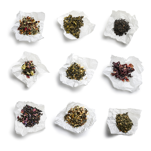 Large assortment of tea on a white background. The view from the top.