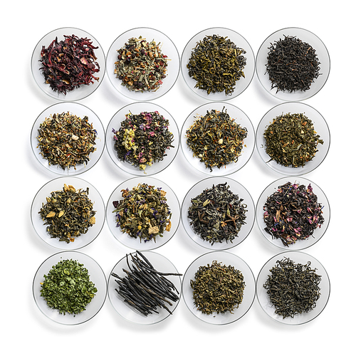 Large assortment of tea on a white background. The view from the top.