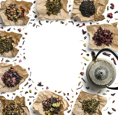 Large assortment of tea on a white background. The view from the top.