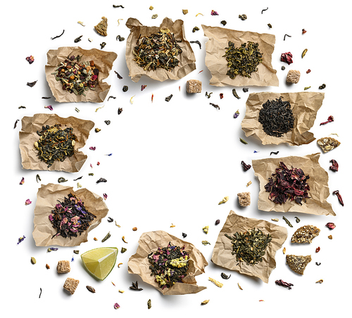 Large assortment of tea on a white background. The view from the top.