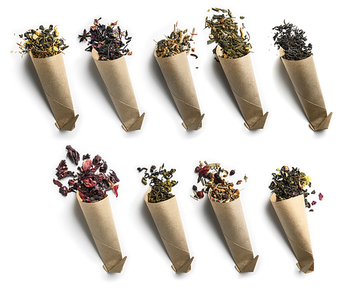 Large assortment of tea on a white background. The view from the top.