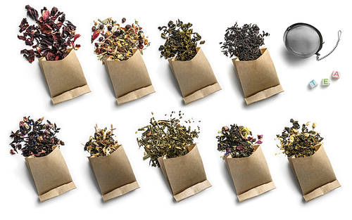 Large assortment of tea on a white background. The view from the top.