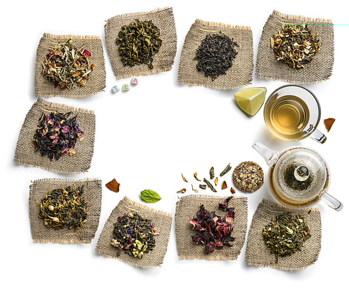 Large assortment of tea on a white background. The view from the top.