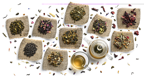 Large assortment of tea on a white background. The view from the top.