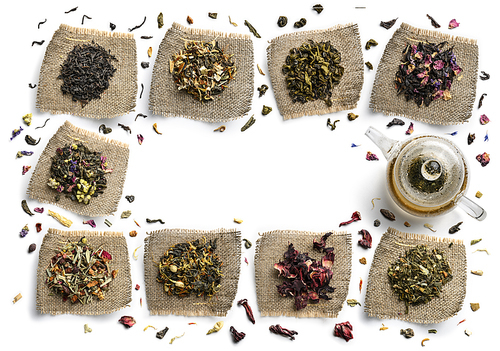 Large assortment of tea on a white background. The view from the top.