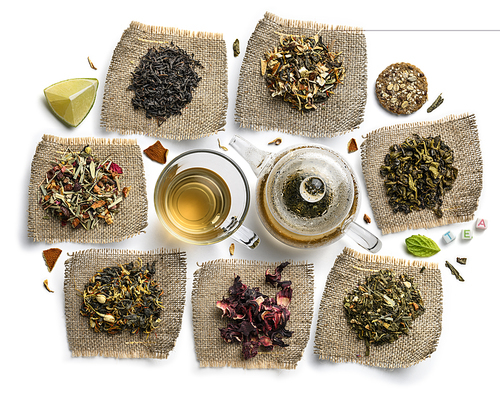 Large assortment of tea on a white background. The view from the top.