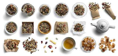 Herbal tea and accessories top view on white background.