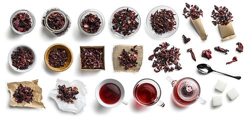 Hibiscus tea and accessories top view on white background.