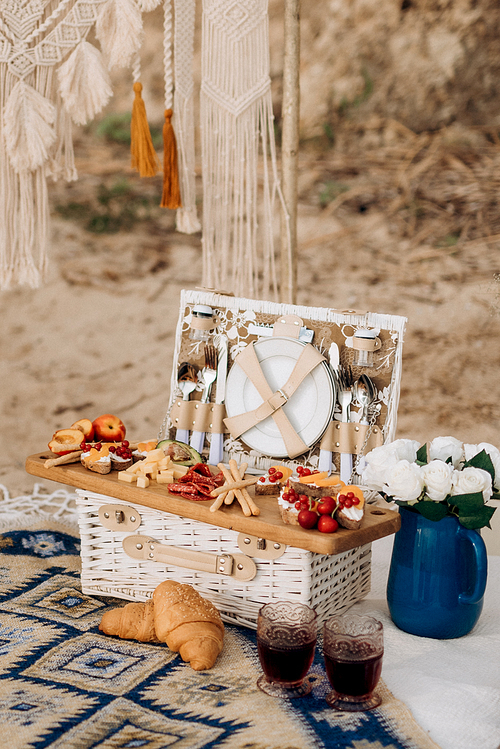picnic in nature with a basket of delicious products