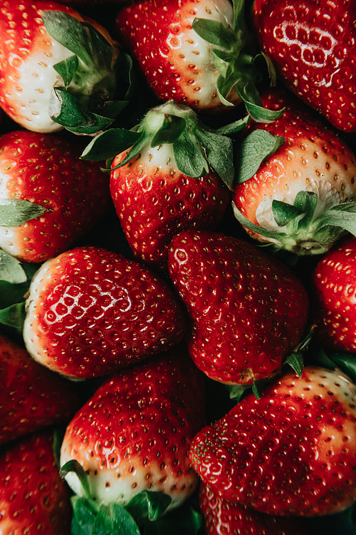 A close up of a bunch of strawberries with healthy aspect, healthy aspect food background