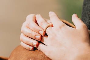 A pair of hands grabbing a rubber ring modern concept promises and marriage