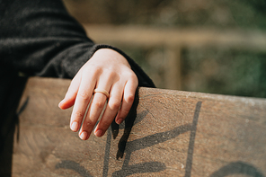 One hand with a rubber ring, marriage concept and freedom, modernity