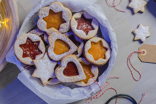Homebaked Christmas Cookies With fruit Jam filling and Icing Sugar.