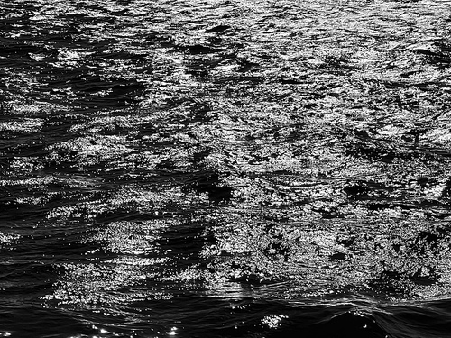 Sea, texture and coastal nature concept. Ocean water as black and white, monochrome surface background