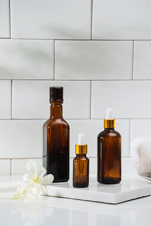 Different cosmetic bottles isolated on white