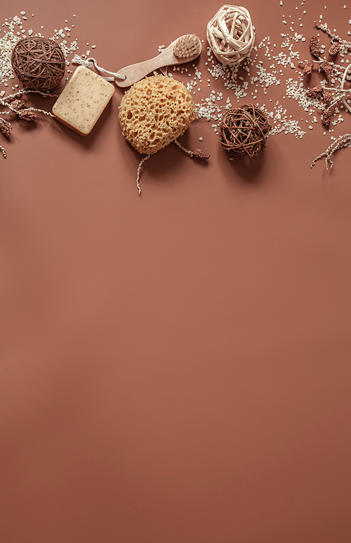 Spa still life with brush, soap, sea salt and decorative details flat lay.