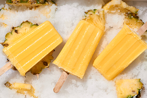 Fruit pineapple popsicle / ice cream stick focused