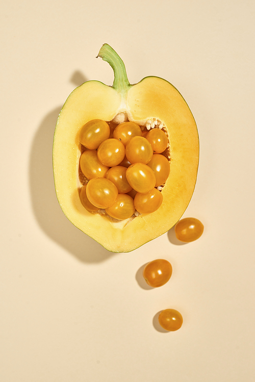 vegetables and fruits: cherry tomatoes and papaya isolated on pastel background for vegans and vegetarians ready for product display or montag