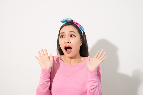 Asian Young Woman in Surprising Emotion, Face Look up above with opened mouth and hands, Emotional of Female Concept, Front view