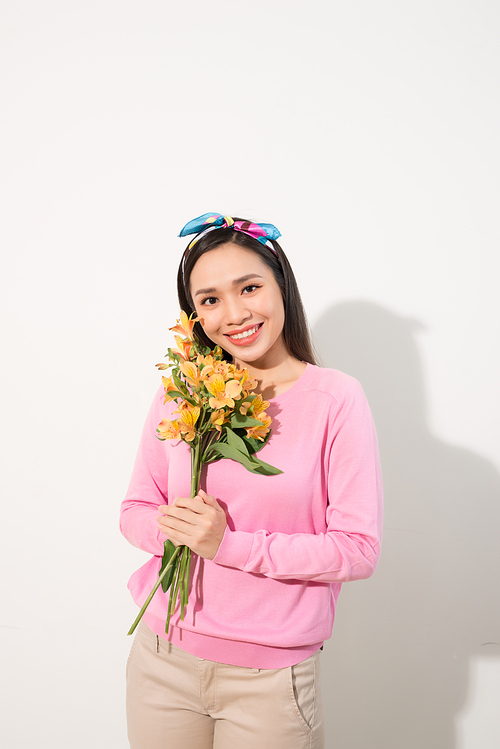 Lifestyle leisure international women's day concept. Close up portrait of lovely cute adorable excited delightful attractive woman holding flowers isolated on white