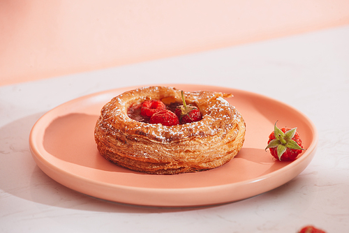 Homemade puff pastry with raspberries. Sweet tasty dessert. decorated with powdered sugar