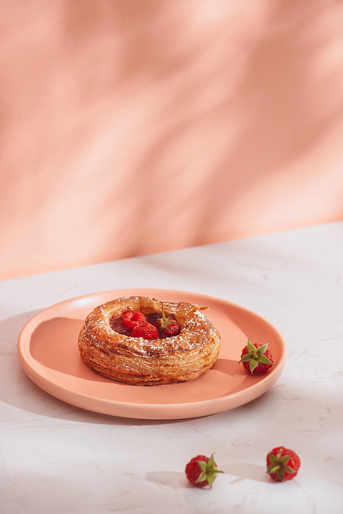 Homemade puff pastry with raspberries. Sweet tasty dessert. decorated with powdered sugar