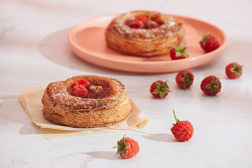 Homemade puff pastry with raspberries. Sweet tasty dessert. decorated with powdered sugar