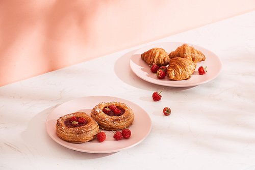 Homemade puff pastry with raspberries. Sweet tasty dessert. decorated with powdered sugar