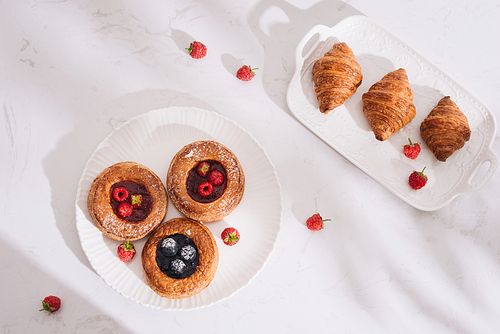 Homemade puff pastry with raspberries. Sweet tasty dessert. decorated with powdered sugar