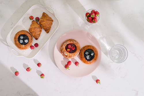 Romantic tropical breakfast Danish pastry, coffee, juice. Summer background