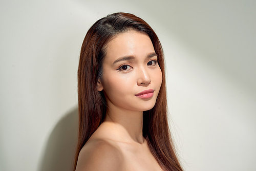 Beauty sunshine girl portrait. Pretty happy woman enjoying summer outdoors in bright Sunny day