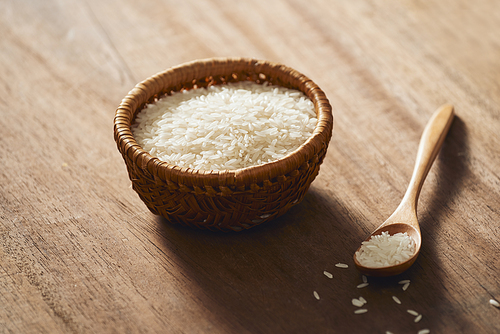 Jasmine  rice isolated on texture background.