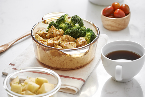 lunch . topped with stir-fried chicken and broccoli, coffee in the daytime