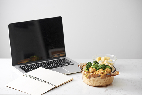 chicken with soy sauce and a . and a laptop for work